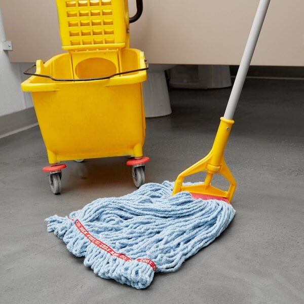 A blue Rubbermaid Web Foot mop head with a yellow bucket on the floor.