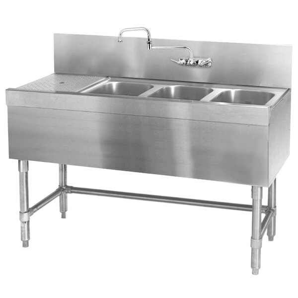 A close up of a Eagle Group stainless steel underbar sink with three bowls and a left drainboard.