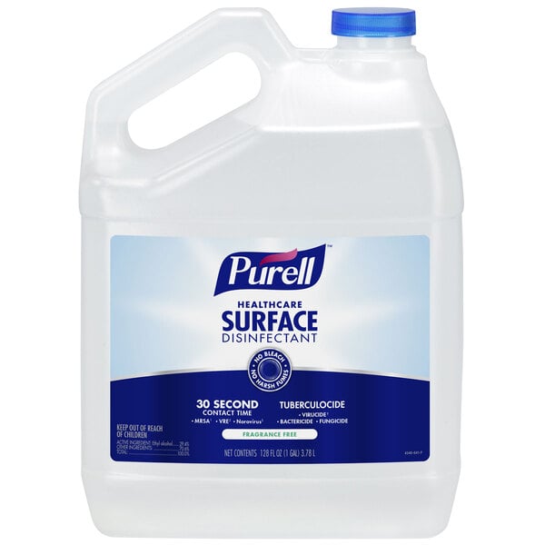 A white Purell jug with a blue label. The label says "Purell Healthcare Surface Disinfectant."