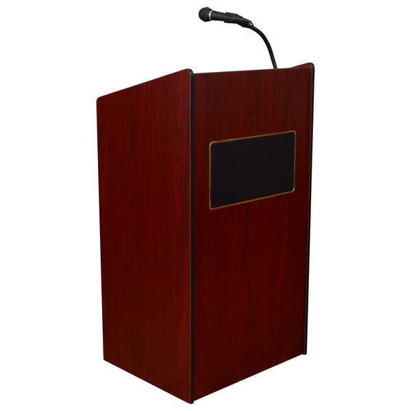 An Oklahoma Sound mahogany floor lectern with a microphone on a black square.