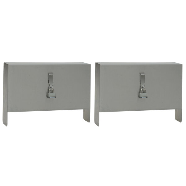 A pair of white metal rectangular objects with metal clips on them.