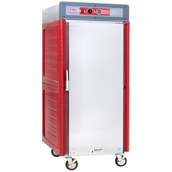 A silver commercial holding cabinet with a red door.