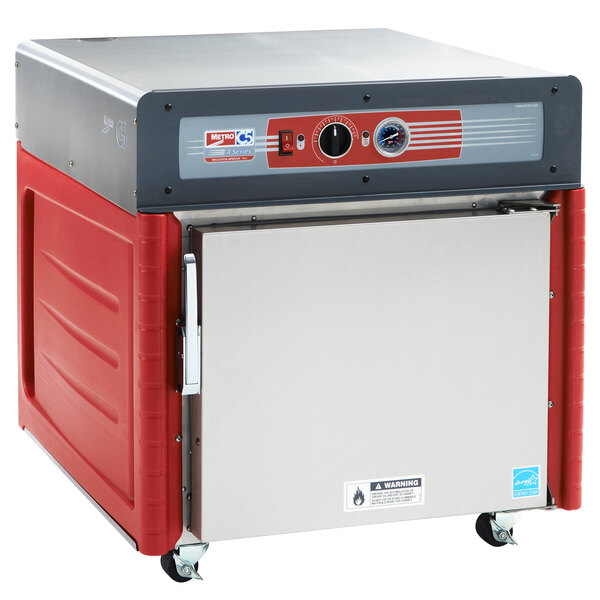A silver Metro insulated hot holding cabinet on wheels.