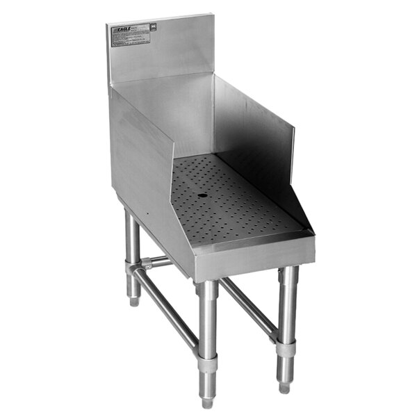 A stainless steel Eagle Group recessed bar drainboard with a drain on it.
