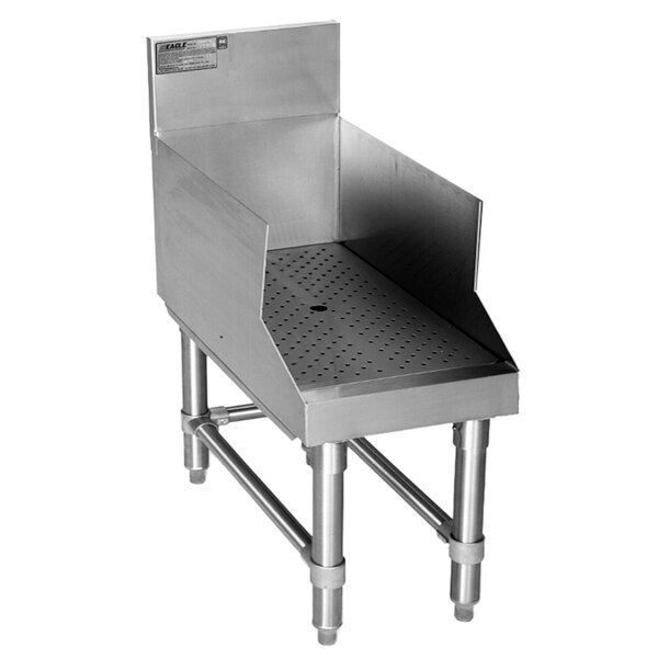 A stainless steel Eagle Group recessed bar drainboard with a drain in it.