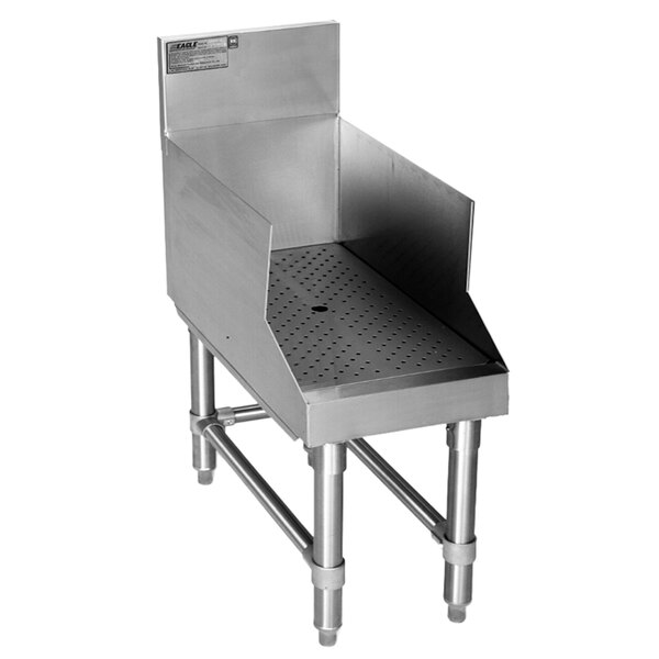A stainless steel Eagle Group recessed bar drainboard with a drain on it.