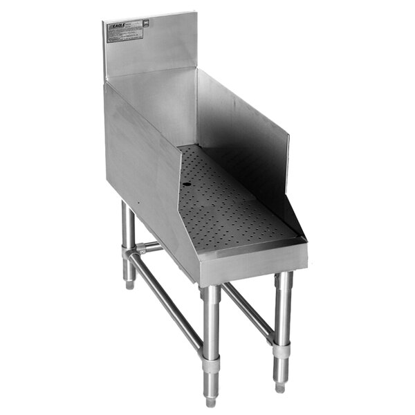 A stainless steel Eagle Group recessed bar drainboard with holes over a stainless steel sink.
