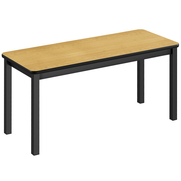 A Correll library table with black legs and a wood top.