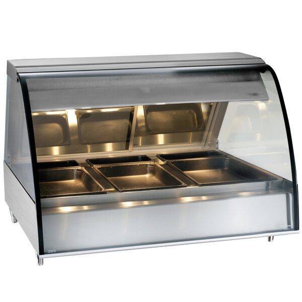 An Alto-Shaam stainless steel countertop heated display case with curved glass over three food trays.