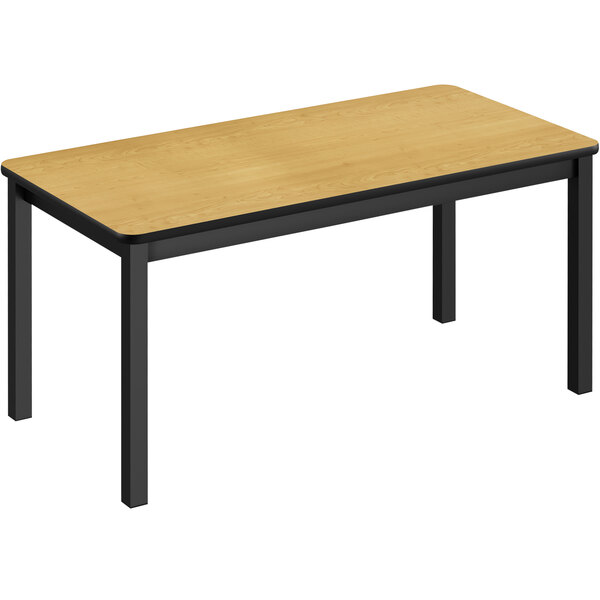 A Correll library table with black legs and a wooden top.