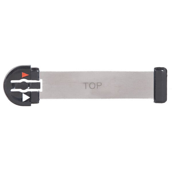 A close-up of a black metal blade with the word "top" on it.