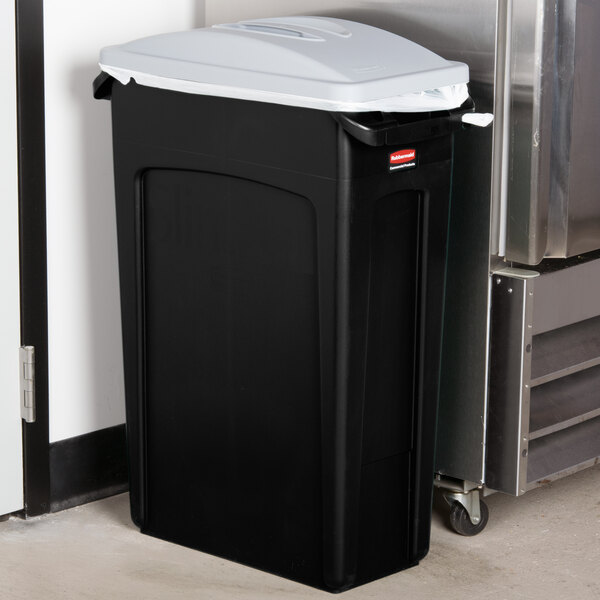 A black Rubbermaid Slim Jim rectangular trash can with a light gray handled lid.