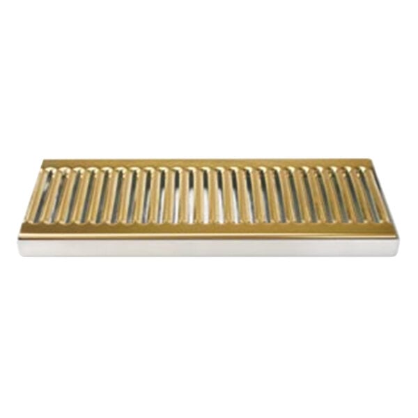 A Micro Matic PVD brass surface mount drip tray with a metal grate with holes.