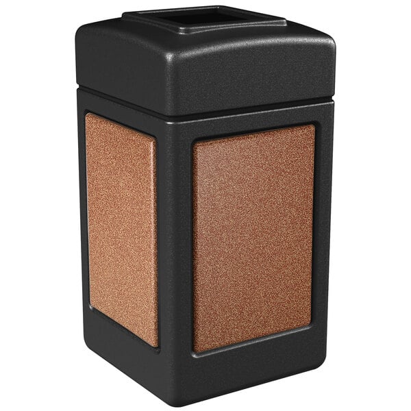 A black and brown Commercial Zone StoneTec decorative trash can with Sedona panels.