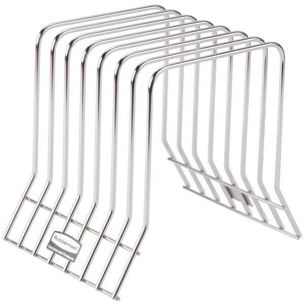 A row of metal Rubbermaid stainless steel cutting board racks with seven boards in each.