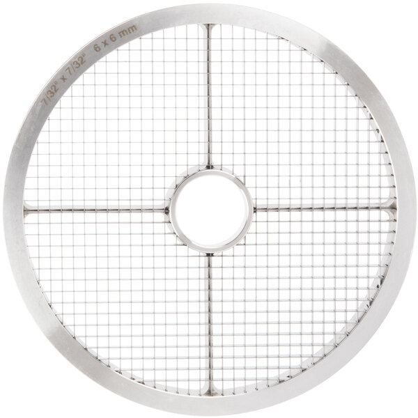 A round metal grid with a hole in the middle.