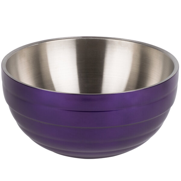 A purple and silver stainless steel Vollrath beehive serving bowl.