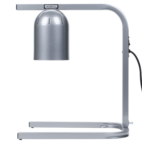 A silver Nemco freestanding heat lamp with a black shade.
