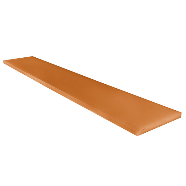 A white rectangular composite cutting board with orange edges.