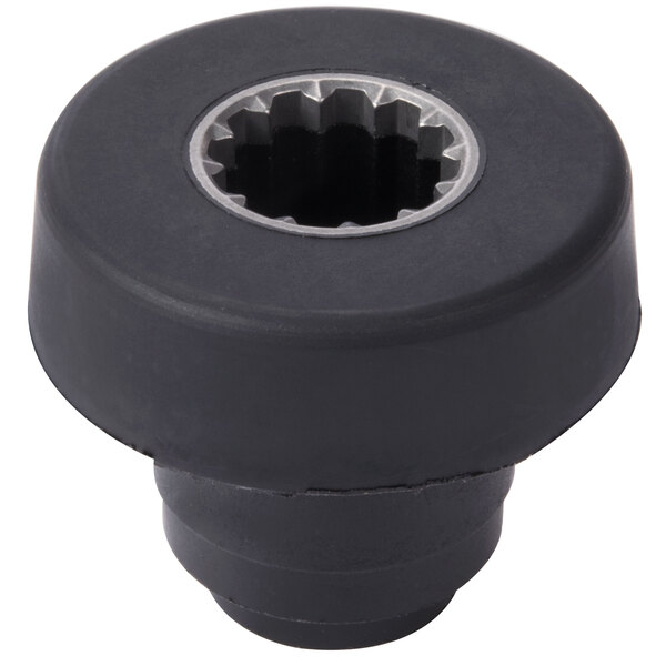 A black round plastic clutch repair nut with a silver center.