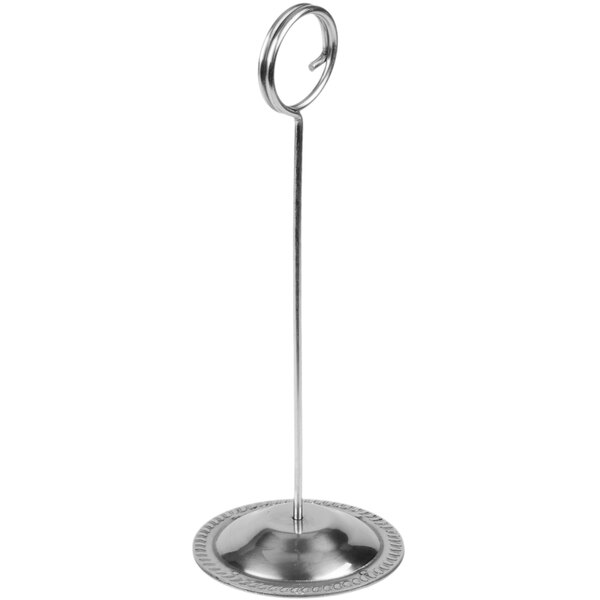 An American Metalcraft stainless steel table card holder with a circular base.