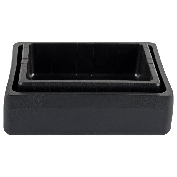 An Avantco black rubber foot on a black plastic container with a square top.