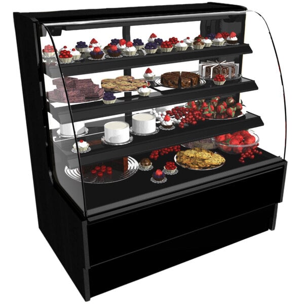 A black Structural Concepts refrigerated bakery display case on a counter with food inside.