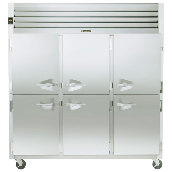 A white Traulsen reach-in refrigerator with stainless steel doors and handles.