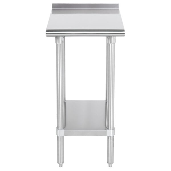 An Advance Tabco stainless steel filler table with a stainless steel undershelf.
