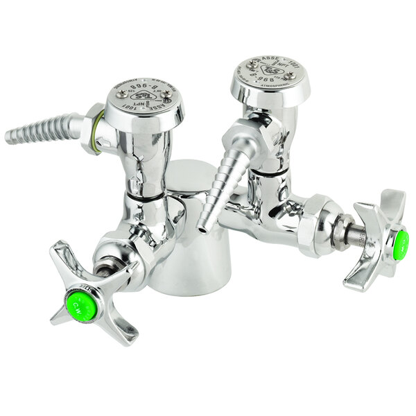 A close-up of a silver T&S laboratory turret faucet with a green knob.