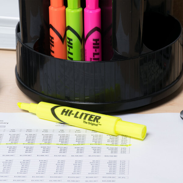 A pack of four Avery Hi-Liter desk style highlighters in yellow, pink, orange, and green tubes in a pen holder.