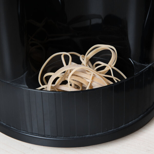 A black container with Universal beige rubber bands inside.