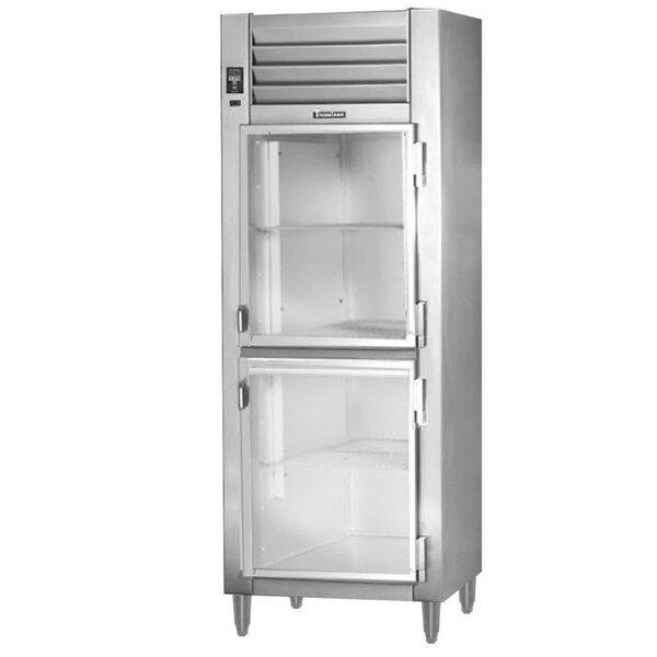 A white Traulsen reach-in refrigerator with glass half doors.