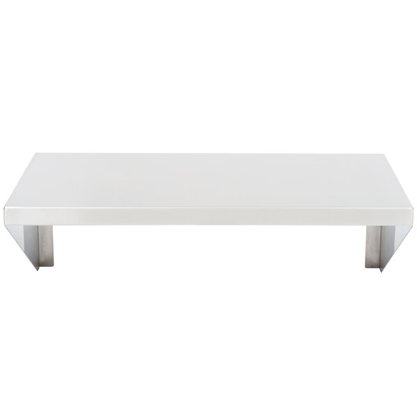 A white rectangular shelf with metal legs.