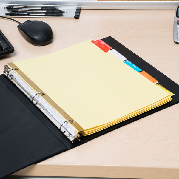 A file folder with Avery Big Tab dividers with yellow paper.