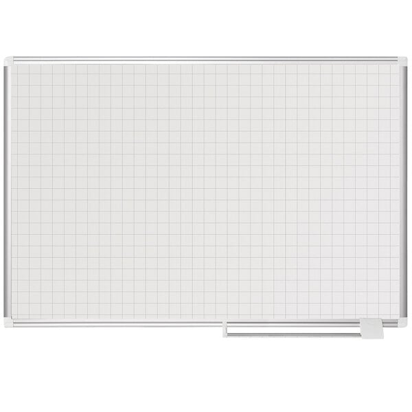 A MasterVision whiteboard with grids on it.