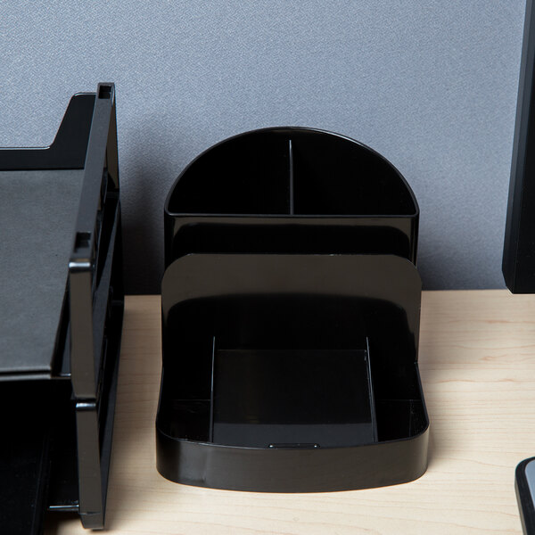 A black Universal plastic desk organizer with 6 sections.