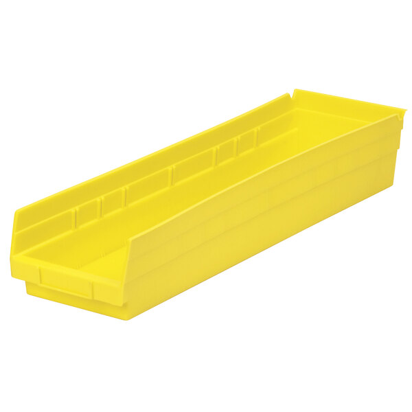 A yellow plastic Metro shelf bin with a long handle.