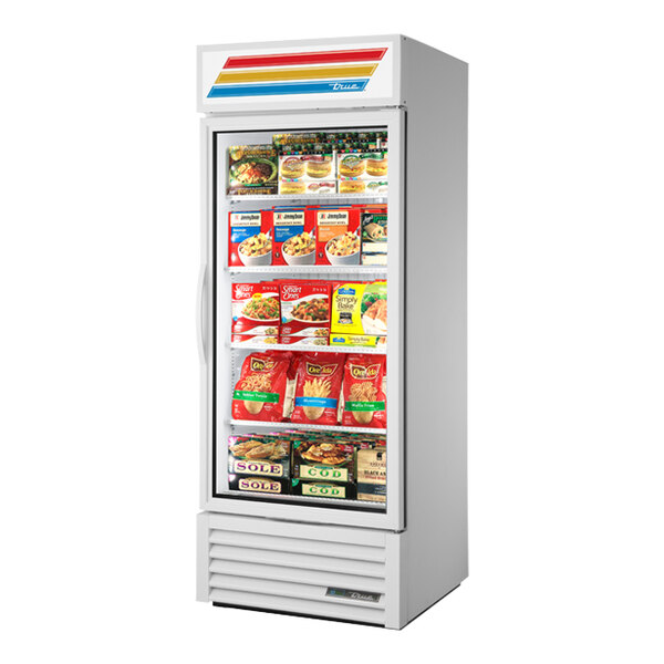 A white True glass door merchandiser freezer with food on the shelves.