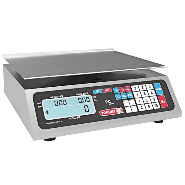 A Tor Rey PC-80L digital price computing scale on a counter with buttons and numbers.