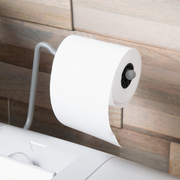 A Universal Office white thermal paper roll on a holder.