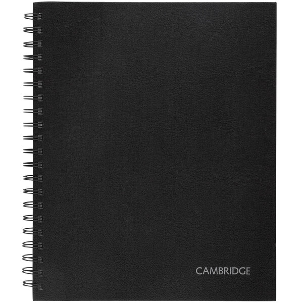 A black Cambridge Limited hardbound notebook with a spiral binding.