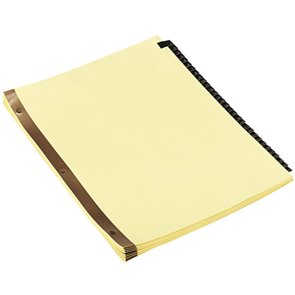 A yellow notebook with brown leather straps.