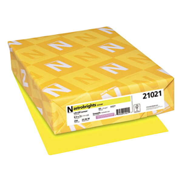 Neenah Astrobrights Lift-Off Lemon yellow paper with white and yellow designs.
