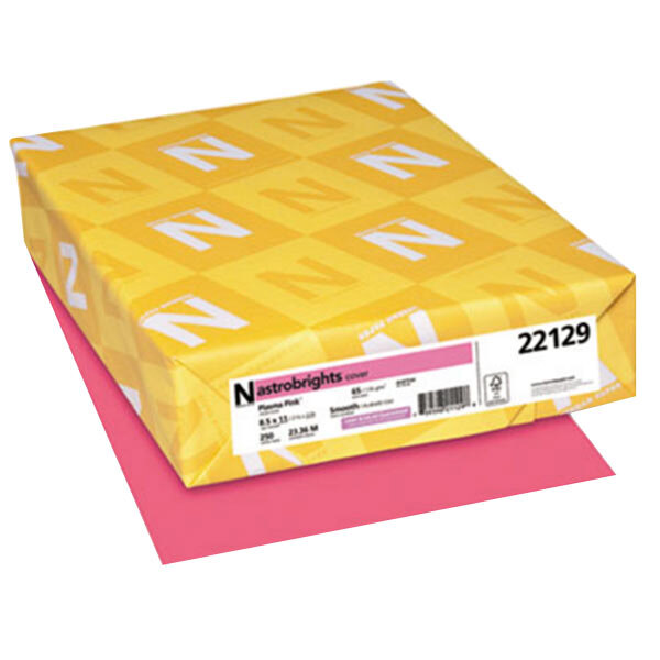 A yellow box with white letters containing Astrobrights Plasma Pink paper.