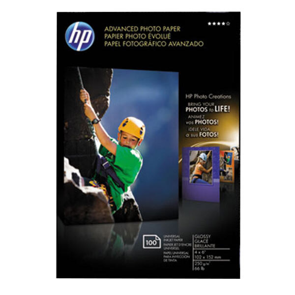 HP Inc. Q6638A glossy photo paper packaging with a photo of a young boy wearing a helmet and climbing a tree.