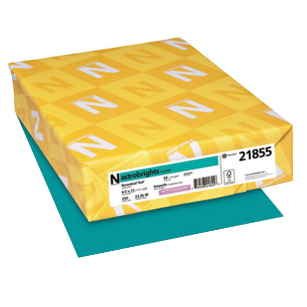 A yellow package of Astrobrights Terrestrial Teal cardstock paper with white lettering.