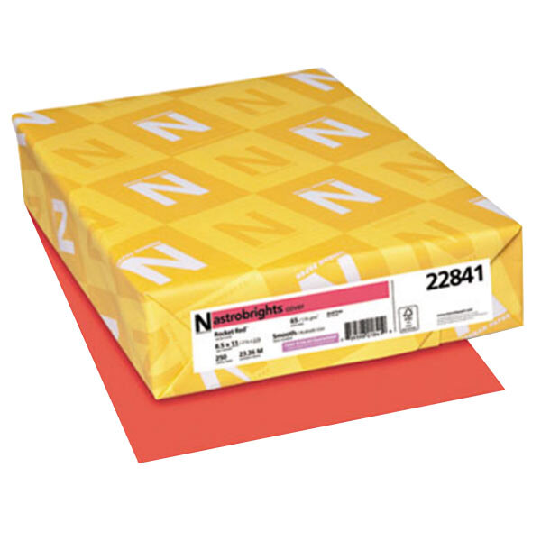 A yellow package of Astrobrights Rocket Red cardstock paper with white and yellow labels.