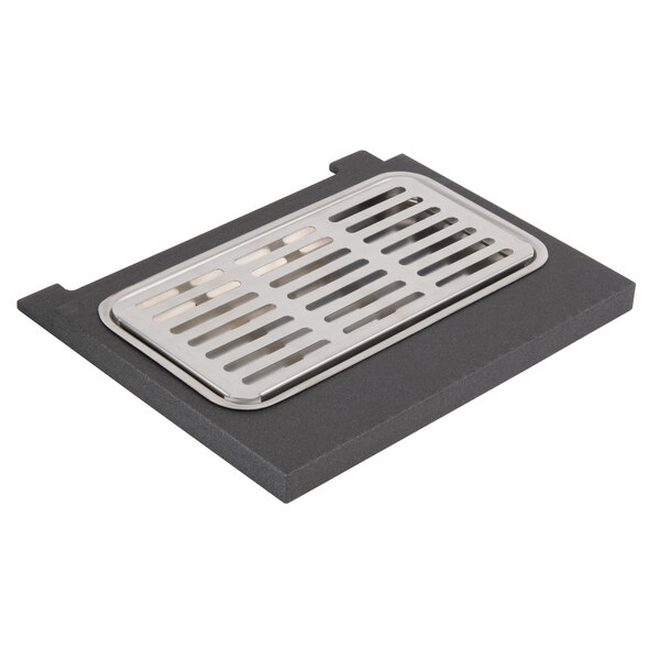 A black metal rectangular drip tray with a metal grate on it.