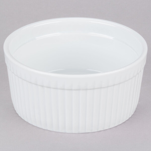 A white CAC fluted souffle bowl with a ribbed rim.